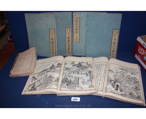 A set of six handmade Oriental  Books containing many illustrations on handmade paper, with another having no illustrations w