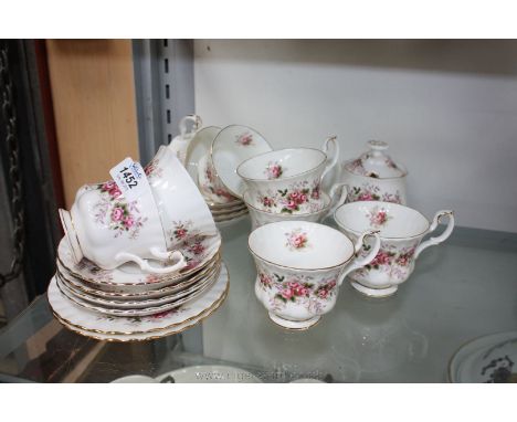 A Royal Albert 'Lavender Rose' part Tea Service including eight cups and saucers, two tea plates and lidded sugar bowl