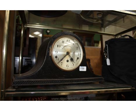 A Napoleon Hat Mantle Clock with three train movement and Westminster chime