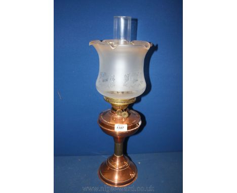 A Copper and Brass Oil Lamp with etched shade
