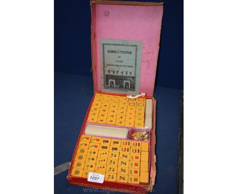 A Travelling Cased Set of  Mah Jongg Tiles T/W Counters, Dice, Wind Indicator and 'Directions of Playing 'Chinese Game of Fou