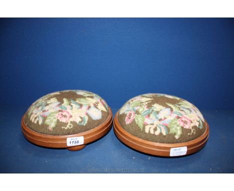 A pair of floral tapestry covered Footrests, 10'' diameter