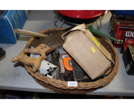 A wicker basket and contents of various tools etc
