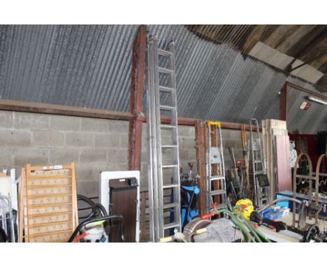 A large three section extending ladder