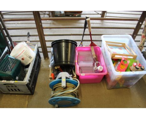 A hose and reel; a box of various tools; glass bricks etc. 
