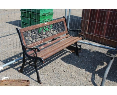 A metal and wooden slatted garden bench