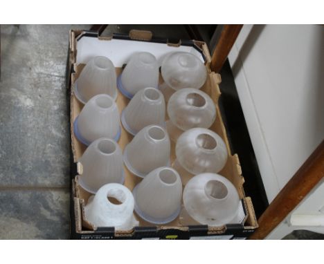 A box of glass lamp shades