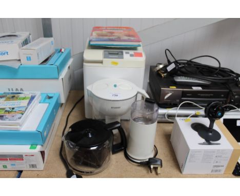A Panasonic bread maker, Kenwood water filter, coffee pot and grinder