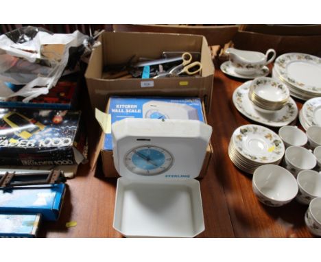 A set of Sterling kitchen scales and a box of kitchen utensils 