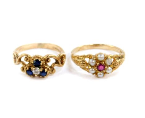 A 9ct gold ruby and seed pearl flower head ring, size K, together with a 9ct gold three stone sapphire and cubic zirconia set