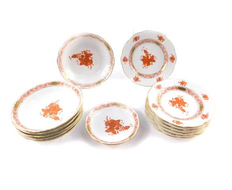 A group of Herend porcelain decorated in the Orange Red Apponyi pattern, comprising six tea plates and saucers, and a spoon d
