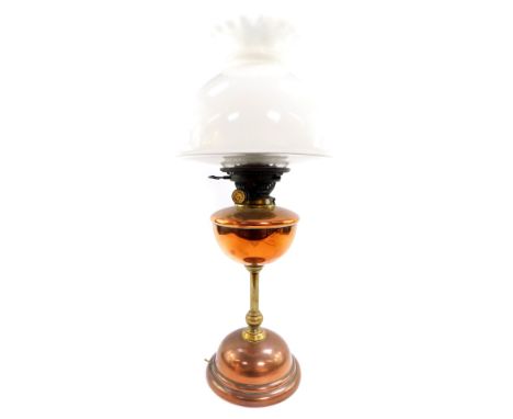 A Hinks' Duplex No 2 copper and brass oil lamp, with a white glass frilled shade, converted to electricity, 58cm H.