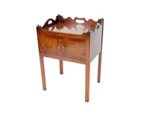 A Georgian style mahogany tray top commode, with two doors, raised on channelled square legs, 73cm H, 52cm W, 41cm D.