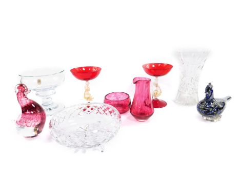 A pair of Venetian ruby glass pedestal sweetmeat dishes, raised on dolphin stems, 15cm H, a Holmegaard cut glass pedestal fru