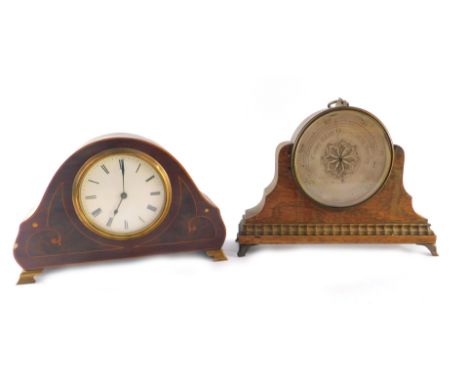 A 19thC mantel shelf barometer, circular silvered dial, in a brass casing, within an oak outer frame, raised on brass bracket