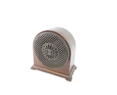 A Radiolux Amplion wooden cased speaker, the case of domed form, with pierced metal fronted grille, raised on bracket feet, 4