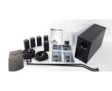 A Bose Acoustimass 10 Series II Home Theatre speaker system, with instructions, and four UB-20B wall ceiling brackets.