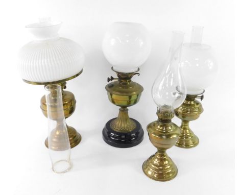 A Duplex brass oil lamp, with glass chimney and fluted white glass shade, 52cm H, brass oil lamp with a white glass shade, ra