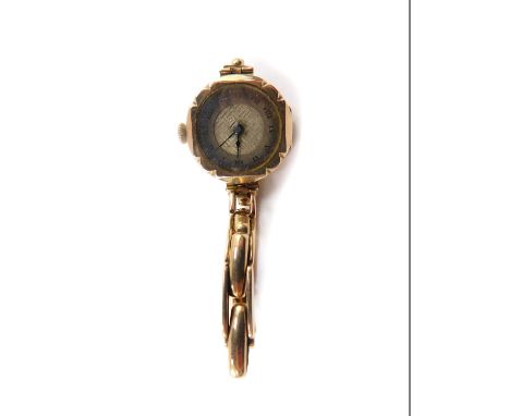 A mid 20thC lady's 9ct gold cased wristwatch, circular silver dial with engine turned decoration, chapter ring bearing Roman 