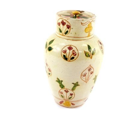 A late 19thC Della Robbia Arts &amp; Crafts pottery jar and cover, of shouldered tapering form, painted with floral and folia