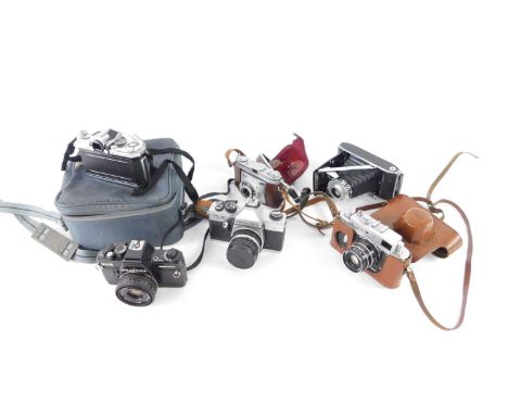 A Praktica BMS electronic camera, Zorki - 4 camera, Praktica TL3 camera, Kodak Retinette camera, Kodak Sterling II, and an Ed
