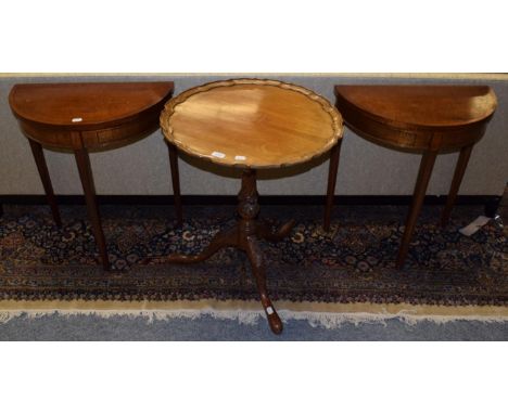 A reproduction pie crust topped tripod table; together with a pair of reproduction D end side tables