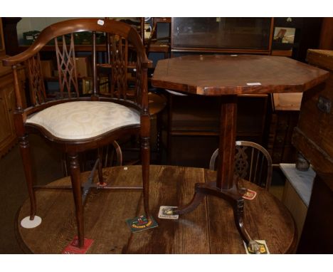 A mahogany tripod table and corner chair
