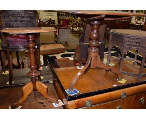 A George III oak tilt top tripod table; together with a Victorian mahogany tripod table (2)