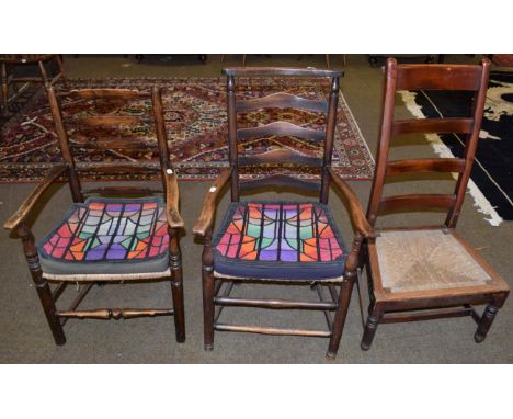 A 19th century elm ladder back armchair; together with a further elm ladder back dining chair; and a ladder back nursing chai