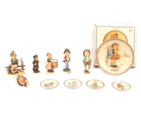 A group of Goebel Hummel figures, comprising The Annual Plate for 1980, boxed, four pin dishes, 1986, 1974, 1994 and 1980, va
