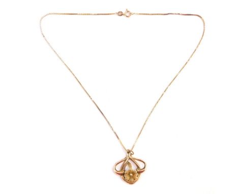 A Balestra 9ct gold pendant and chain, the Art Nouveau design pendant of three twist form with central flower, yellow metal u
