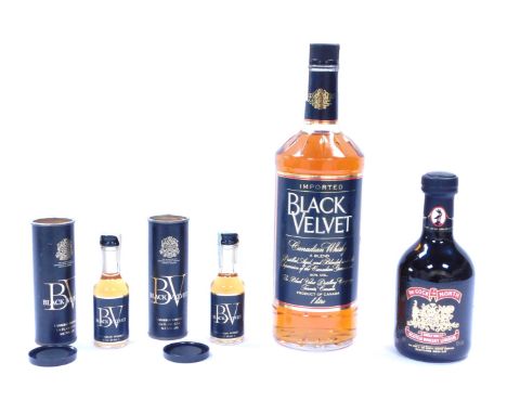 Four bottles of whiskey, comprising Black Velvet Canadian Whiskey 1lt bottle, two 1.6fl oz Black Velvet Whiskey bottles in pr