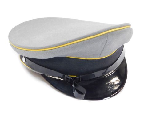 A German Army officer's peaked cap, possibly WWII Wehrmacht.&nbsp;