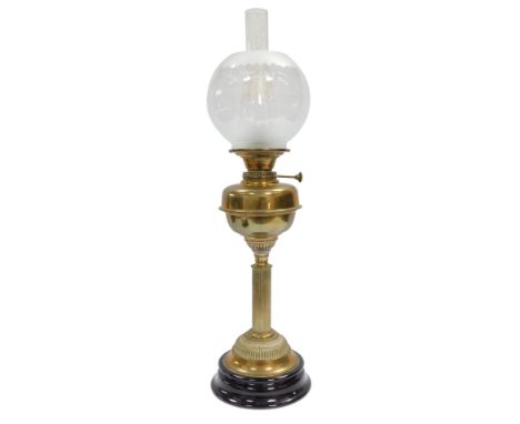 A Youngs of Coventry oil lamp, on brass stemmed body with a domed foot, on ebonised base, with etched shade, 50cm high exclud