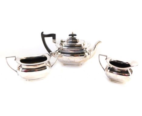 A Walker &amp; Hall silver plated three piece tea service, comprising teapot, milk jug and sucrier, the teapot with ebonised 