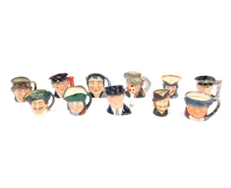 A group of small Royal Doulton character jugs, comprising The Fortune Teller, The Engine Driver, Paddy, The Postman, The Poli