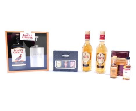 A group of Whiskey, comprising two William Grant's Fine Scotch Whiskey 35cl bottles, a Glenmorangie Single Highland Malt Scot