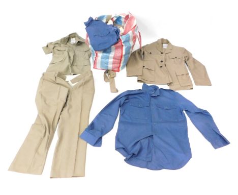 A group of Army, Navy and RAF shirts and trousers.