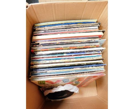 A group of 45rpm and 33rpm records, to include Stevie Wonder, AC/DC, Grease, Elvis's Golden Records, Tina Turner, Eddie Cochr