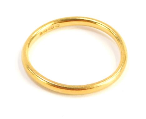 A thin 22ct gold wedding band, of plain design, ring size K½, 2.2g all in.