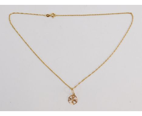 A 9ct gold pendant and chain, the star set pendant on a fine link neck chain, 40cm long, 1.2g.