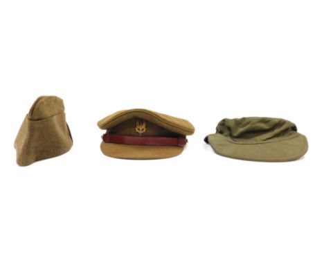 Three military caps, comprising a British Army peaked cap, a field service cap and a Dutch Army cap. (3)