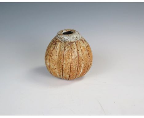 A Studio Pottery seed pod vase, possibly John Maltby, incised mark, M and dots to base, 11cm high. 