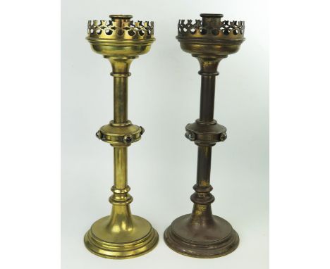 Pair of Victorian Gothic Revival brass candlesticks with banded agate cabochon decoration, in the style of Jones &amp; Willis