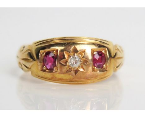 Ruby and Old Cut Diamond Three Stone Ring in an unmarked high carat gold setting, size P.25, 4g 