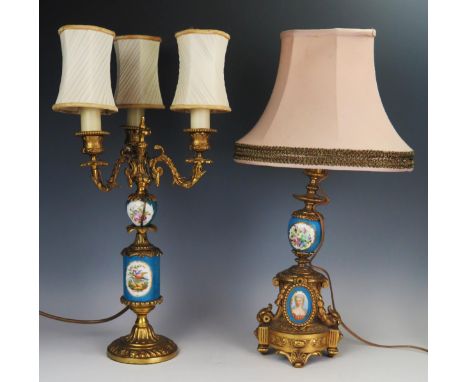 Two early 20th Century Louis XVI style electric lamp base, gilt metal and Sevres style celeste blue porcelain panels, one sig