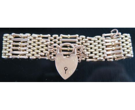 9ct Gold Gate Link Bracelet with safety chain, 19.5mm wide, clasp stamped 9ct LW&amp;G (Lawson Ward &amp; Gammage), 25.5g 