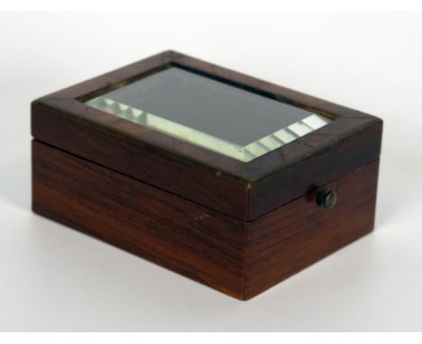 A 19th Century viewing box, probably for a watch, a rectangular bevelled glass panel hinge lid with brass push button clasp, 