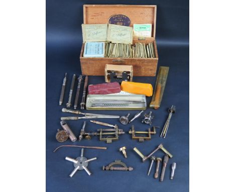 Collection of Clock Spring Winders, E. Delfosse springs in original packaging and other watch and clock maker's tools 