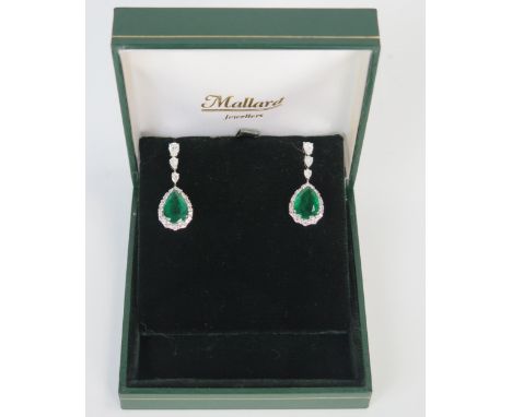 Pair of 18ct White Gold, Emerald and Diamond Pear Drop Pendant Earrings, 13x9.5mm emeralds, c. 33mm drop, 8g 